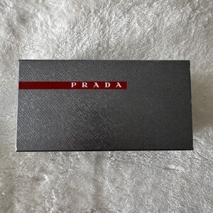 Prada empty sunglasses grey box Prada red line logo